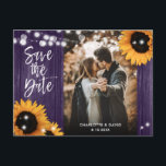 Purple Sunflower Wedding Photo Save The Date Ankündigungspostkarte<br><div class="desc">Rustic purple floral wedding photo save the date postcard featuring sunflowers and string lights on a barn wood background.</div>