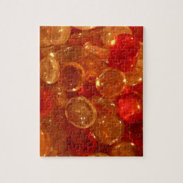 Puzzle aus Rot, Orange und Golden Bling