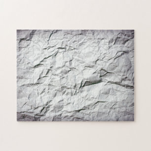 Puzzle aus zerknittertem Papier