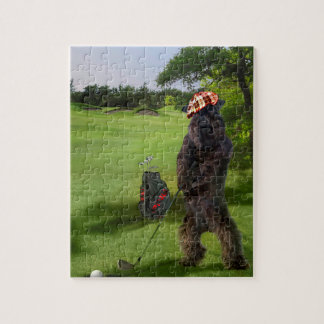 Puzzle avec la scène jouante au golf drôle de