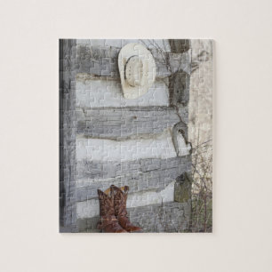 Puzzle Bottes et casquette de cowboy en dehors de cabine