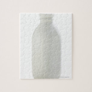 Puzzle Bouteille de lait sur arrière - plan blanc