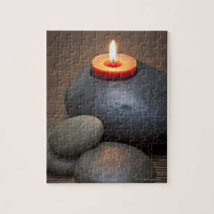 Puzzle Brûler flamme de bougie avec des rochers en toute 
