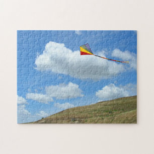 Puzzle - Cerf-volant volant au-dessus d'une collin