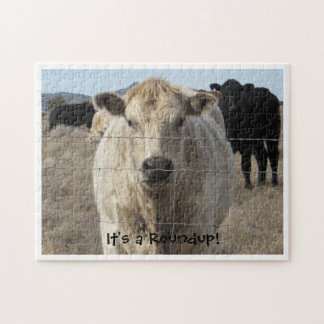 Puzzle C'est un rassemblement ! Troupeau de vache noir et