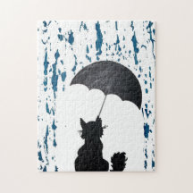 Chat sous le parapluie