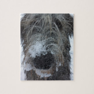Puzzle chien-loup irlandais jouant dans la neige