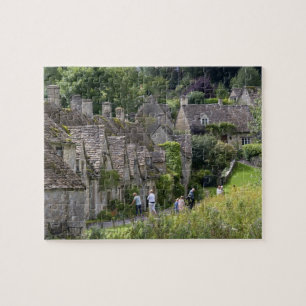 Puzzle cottages en pierre de Cotswold dans le village de