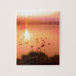 Puzzle Coucher de soleil rose et de lac de pêche