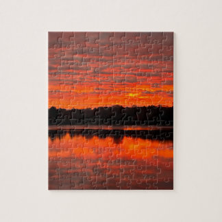 Puzzle du lever de soleil sur le lac Lyon dans le