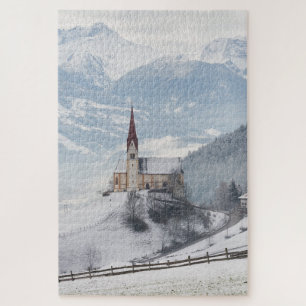 Puzzle Église dans un paysage alpin d'hiver