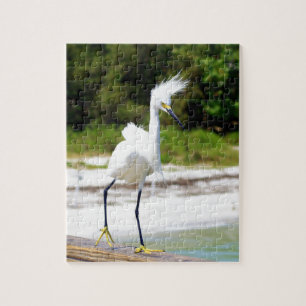 Puzzle Egret de neige soufflé par le vent
