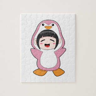 Puzzle Enfant avec costume de pingouin