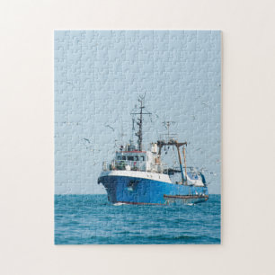 Puzzle Fishing vessel comes back to the port
