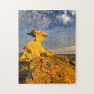 Puzzle Formation sculptée des Badlands dans l'herbe court