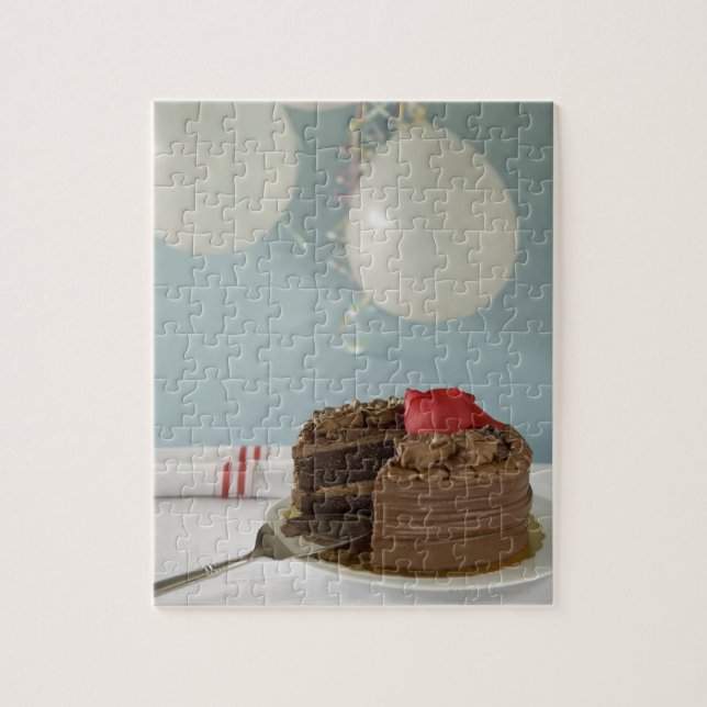 Puzzle Gâteau au chocolat avec tranche manquante sur la t (Vertical)
