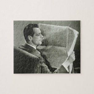 Puzzle Homme d'affaires lisant le journal