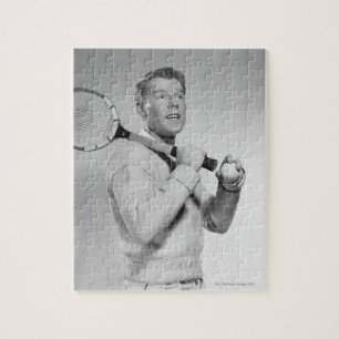 Puzzle Homme tenant la raquette de tennis