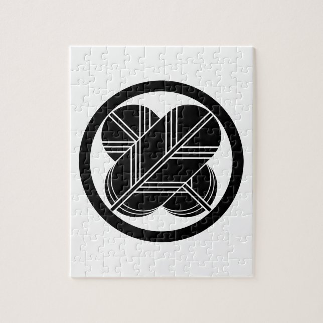 Puzzle Intersecting hawk feathers with foot in circle (Vertical)