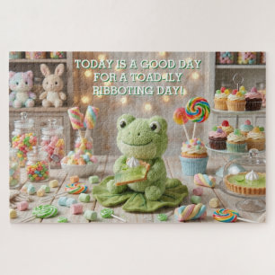 Puzzle Jolie grenouille en peluche tenant une tarte au ci