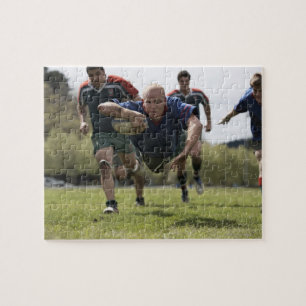 Puzzle Joueur de rugby qui saut sur le terrain avec balle