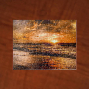 Puzzle Le lever du soleil et la mer