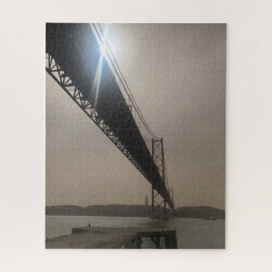 Puzzle Le pont Silhouetté contre le soleil à Lisbonne