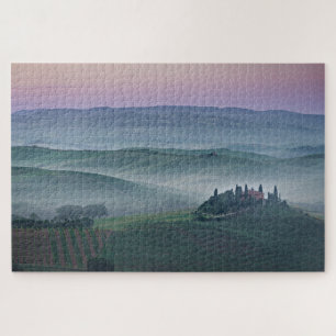 Puzzle Lever de soleil au-dessus d'un paysage brumeux de