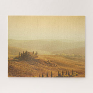 Puzzle Lever de soleil orange au-dessus d'un paysage en