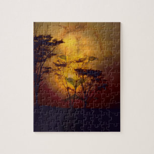 Puzzle Lion regardant au-dessus du coucher du soleil
