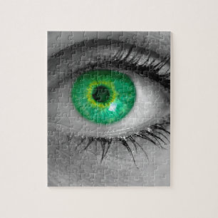 Puzzle L'oeil avec iris vert regarde la macro de concept