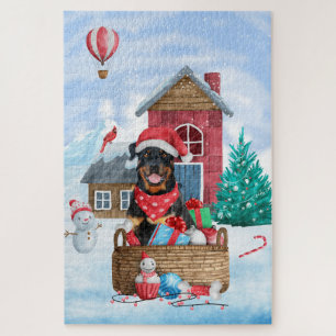 Puzzle Maison de Noël pour chien Rottweiler dans la neige