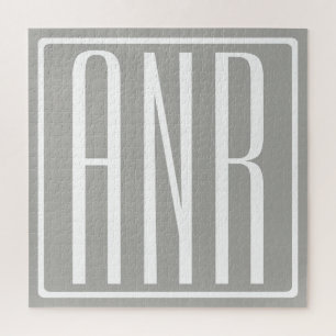Puzzle Monogramme initial   Blanc sur gris clair