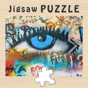 Puzzle OEil bleu sur le mur de graffitis Photo -