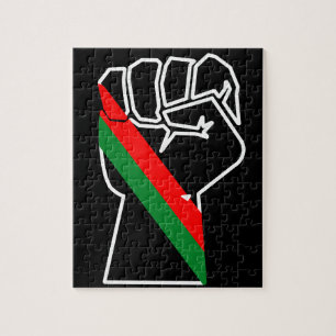 Puzzle orgueil noir poing vert rouge pan drapeau africain