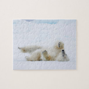 Puzzle Ours polaire roulant dans la neige, Norvège