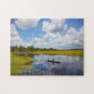 Puzzle Pêcheur sur un lac au Guyana.