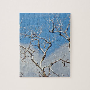PUZZLE PRINTEMPS PRÉCOCE AVEC CIEL BLEU ET BRANCHES D'ARB