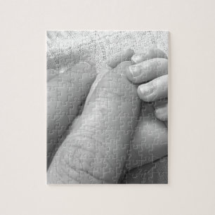 Puzzle Prise de mains de doigts de main de bébé