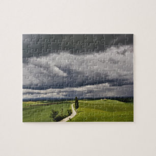 Puzzle Route et nuages d'orage, région rurale de Toscane,