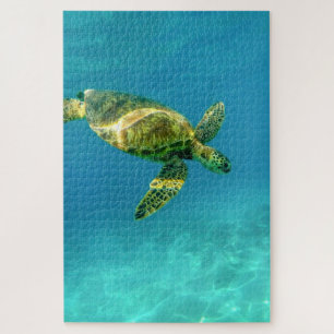 Puzzle Tortue de mer nageant dans l'eau turquoise de l'oc