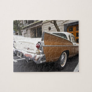 Puzzle Une voiture classique Studebaker Silver Hawk garée