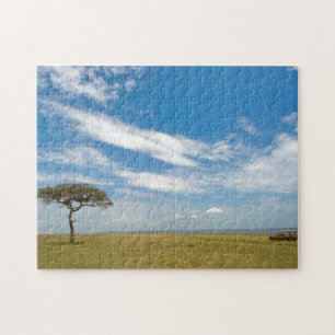Puzzle Véhicule de safari sur les plaines africaines ouve