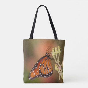 Queen-Schmetterling auf einem Ast Tasche