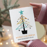 Quirky Retro Weihnachtsbaum Mitte Jahrhundert Mode Feiertagskarte<br><div class="desc">Geben Sie Ihren Freunden und Ihrer Familie eine lustige,  quirlige,  Mitte des Jahrhunderts gestaltete Urlaubskarte in diesem Jahr. Mit seinem trendigen Retro-Weihnachtsbaum in Türkis,  Orange,  Bräune,  Gold und Schwarz wird er sicher von allen geliebt,  die ihn empfangen. Auch erhältlich in mit einem Foto auf der Rückseite.</div>