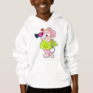Rabbit comme coiffeur avec sèche-cheveux