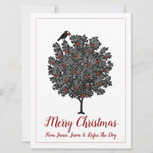 Rabe schmückt Weihnachtsbaum Feiertagskarte