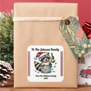 Raccoon mit Weihnachtslicht auf Geschenk Quadratischer Aufkleber