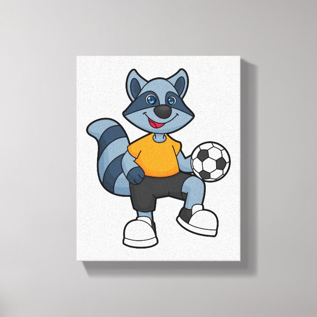 Racoon als Fußballspieler mit Fußball Leinwanddruck (Vorderseite)