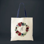 Radiant Bloom Monogram Tragetasche<br><div class="desc">Diese personalisierten Tasche sind so konzipiert, dass sie zu unserer Radiant Bloom Kollektion passen, und machen wunderschöne Geschenke für Ihre Brautmädchen. Personalisieren Sie sich mit einem Single Initial Monogramm in eleganter handgeschriebener Schrift, umgeben von einem Kranz von Aquarellfarben-Blume in reichen Marinetönen und Bordeaux.</div>